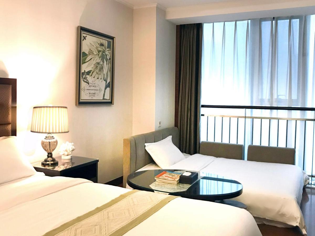 Qingdao Elegant Central Apartment Экстерьер фото